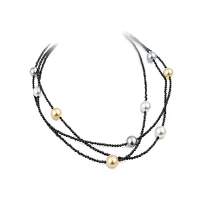 Elegant multi-layer black bead necklace with white, grey, and gold pearls for women.