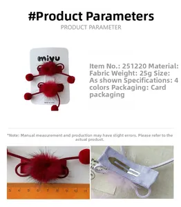 Détail de pince à cheveux à pompon rouge avec ruban à mesurer montrant 6cm et base métal