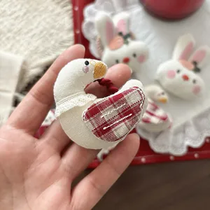 Handgemaakte haaraccessoires set voor kinderen met gevulde konijn en gans knuffels