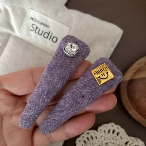 Sweet purple wool hair clips set with rhinestones and Hello greeting metal plate