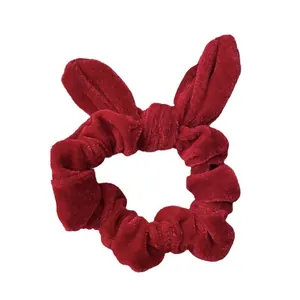 Elegant red velvet scrunchie with bunny ears, soft texture and high-stretch hair tie