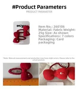 Vue détaillée de barrettes à nœuds rouges pour enfants avec dimensions et emballage