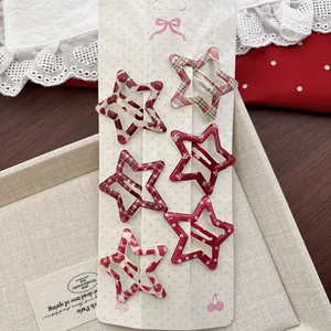 Lot de 6 barrettes en étoile avec imprimé léopard rouge et pois sur présentoir