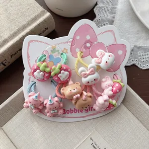 Détail de l'ensemble d'élastiques à cheveux pour enfants avec lapins et ours mignons