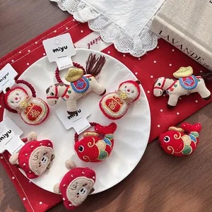 New Year festive plush pony and koi fish hair ties with 3D embroidery and lucky charms