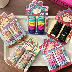 Set di elastici per capelli colorati per bambine in tonalità caramella e Morandi