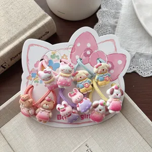 Détails de neuf élastiques à cheveux pour enfants avec figurines sur carte nœud