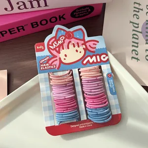 Dettaglio di elastici per capelli durevoli per bambini in sfumature rosa e blu
