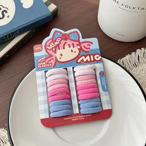 Detail of 20 high-elastic seamless hair ties in candy gradient colors for kids