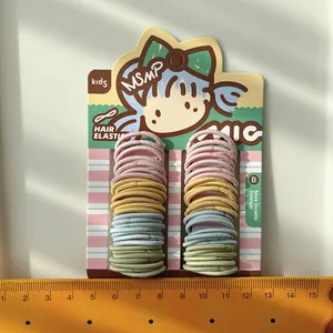 Elastici per capelli color pastello per bambine su cartoncino, tessuto resistente