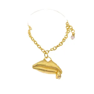Chunky vintage gold necklace featuring a bold textured 3D lips pendant for women.
