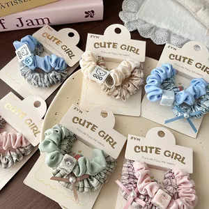 Set di elastici per capelli in tessuto a scacchi con graziose etichette a forma di orso