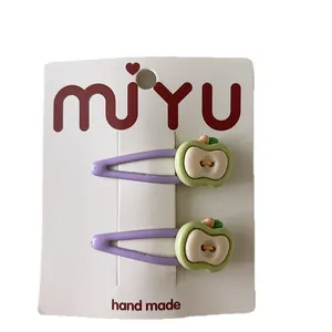 Cute green apple cartoon hair clips for girls set of two on white display card