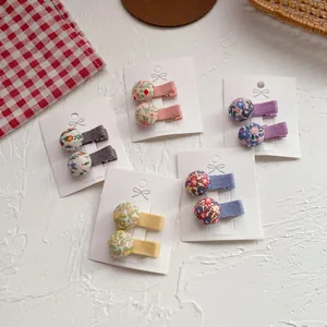 Set de horquillas de tela con flores para niñas en varios colores con tarjeta de regalo