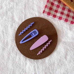 Lot de 4 barrettes violet mat pour enfants avec formes ondulées et gouttes d'eau évidées