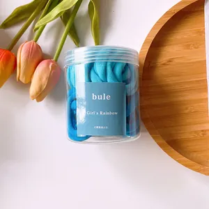 Lot d'élastiques à cheveux bleus en pot transparent avec texture serviette douce