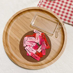 Set van pastelkleurige metalen BB-haarclips in verschillende roze en rode tinten