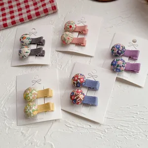Set de 5 pinzas para el pelo con estampado floral en colores pastel para niñas pequeñas