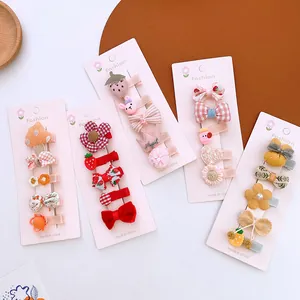 Set of 5 cards with colorful cute hair clips for girls featuring bows, fruits and animals