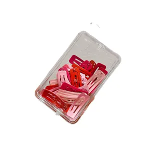 Set van 30 roze snoepkleurige vierkante BB-haarspelden in een transparante opbergdoos