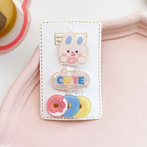 Set de tres adorables pinzas para el cabello de acrílico con dijes de conejo y donas