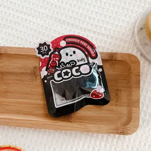 Detail of 30pcs black high-elastic children hair ties in 20mm COCO kids packaging