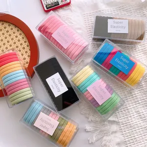 Set of colorful high-elasticity hair ties in a clear box with candy-colored macaron tones