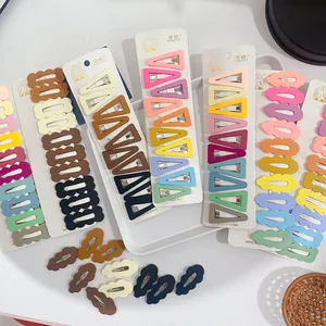Set of macaron-colored BB hair clips in wavy and triangle shapes on a white card
