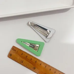 Minimalist triangular BB hair clips in pastel green and cream white, 5cm length