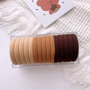 Set of 15 high elastic seamless hair ties in three earth tones with a clear storage box