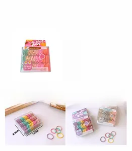 Detailed dimensions of 130pcs colorful elastic hair ties in a clear plastic storage box
