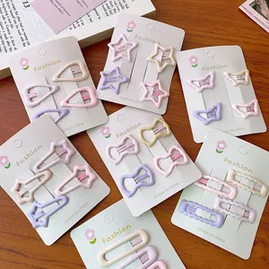 4er-Set pastellfarbene Haarklammern in Herz- und Sternform in Creme, Rosa und Lila