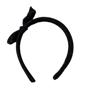 Sparkling black velvet headband with a side bow design for women and girls