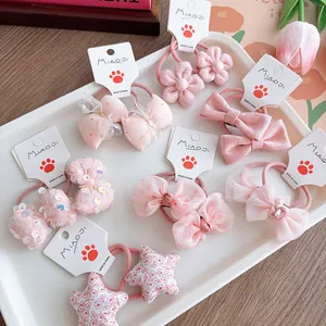 Pink sweet bow hair ties for girls with high elastic bands and various fabric patterns