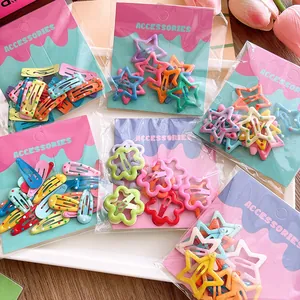 Colorful star and floral hair clips set for girls in candy colors on display card