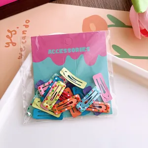 Colorful star-shaped hair clips set for girls featuring solid colors and polka dot patterns