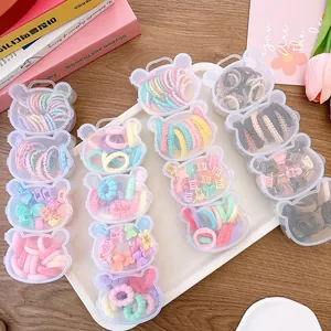 Colorful kids hair accessories set in cute bear-shaped boxes with elastics and clips