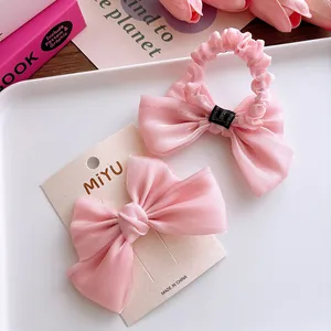 Rosa Organza Schleife Haarspange und Haargummi Set mit weicher Seidentextur