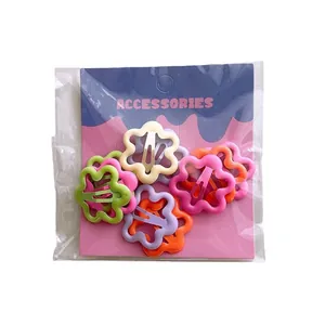 Colorful floral star hair clips set for girls in multiple candy colors on card