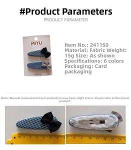 Detailed view of blue checkered bow hair clips set with weight measurement display
