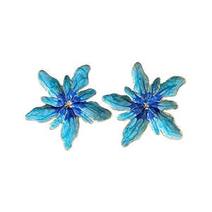Exquisite blue gradient enamel flower stud earrings with gold trim and silver needles