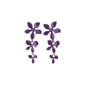 Elegant purple enamel flower drop earrings with a minimalist triple floral design