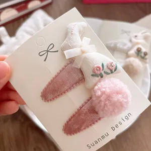 Pink velvet children's hair clip set with sweet rabbit embroidery and soft pom-poms