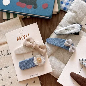 Sweet blue fabric hair clips set for girls featuring plaid heart and bow designs