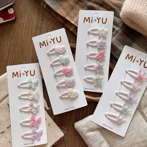 Détails de l'ensemble de pinces à cheveux scintillantes cœur et étoile aux tons pastel