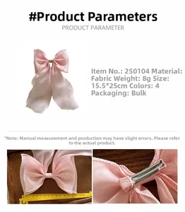 Detail view of pink fabric bow hair clip showing 15.5x25cm size and metal clip attachment