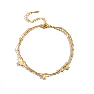 Detailed view of a double-layered gold stainless steel anklet featuring three star charms