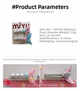 Detail view of pearl sequin mermaid tail hair clips with measurements on display card