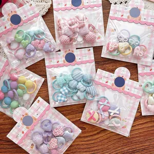 Détails d'assortiment d'élastiques cheveux pour enfants avec nœuds et cœurs colorés