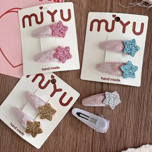 Sparkly star hair clips for girls set with velvet trim in pink, blue, gold, and silver